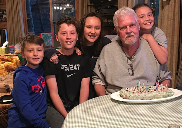 Tom Scott with his grandchildren in 2020.