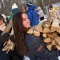 Leaders Club members carrying wood during a service project.