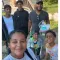 Mercedes and Mack with their children at camp in 2026