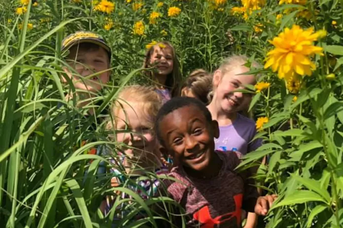 Kids in a flower patch