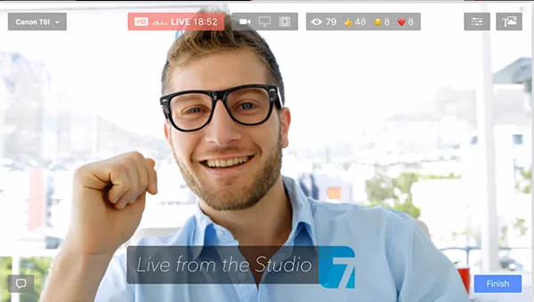 A hipster white man broadcasts using Ecamm Live for Mac